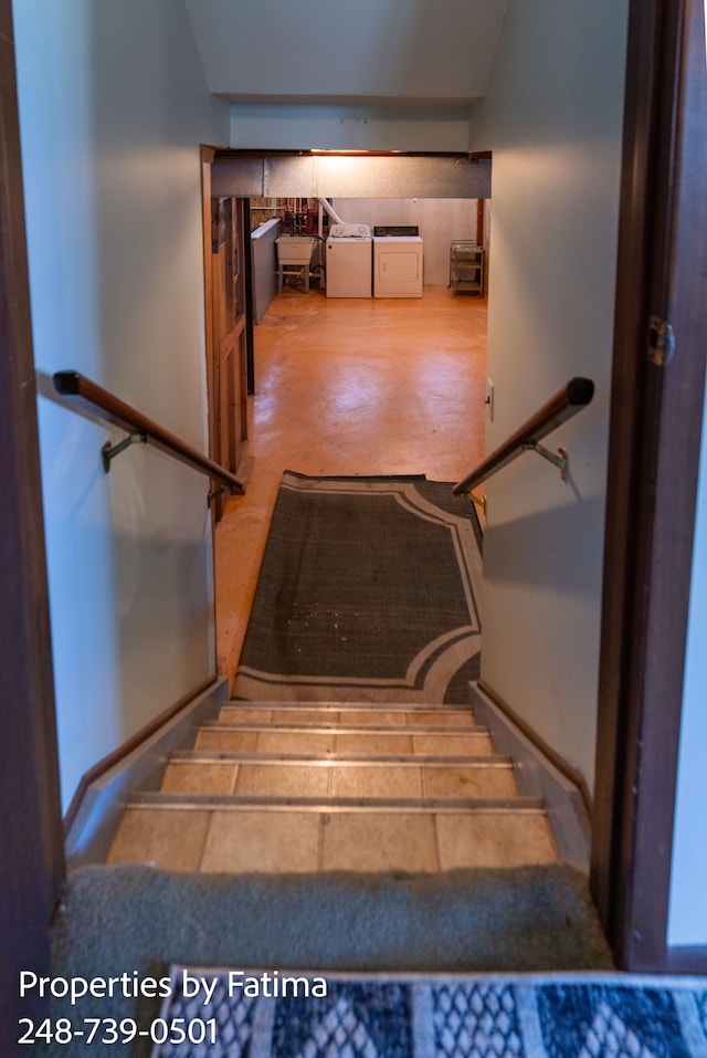 stairs with washer and clothes dryer