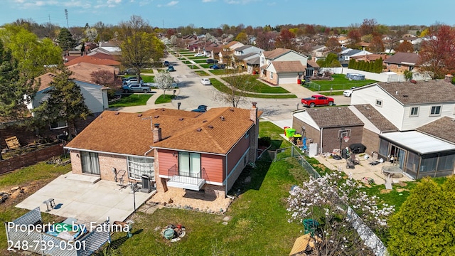 drone / aerial view with a residential view