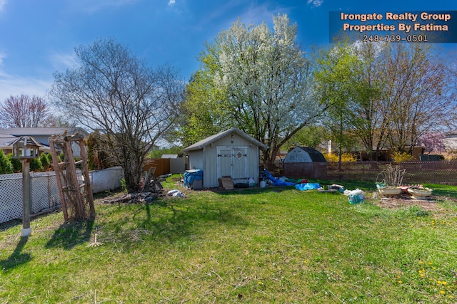 17906 Cider Mill St, Macomb, MI 48044 - view of yard with a storage shed and an outbuilding