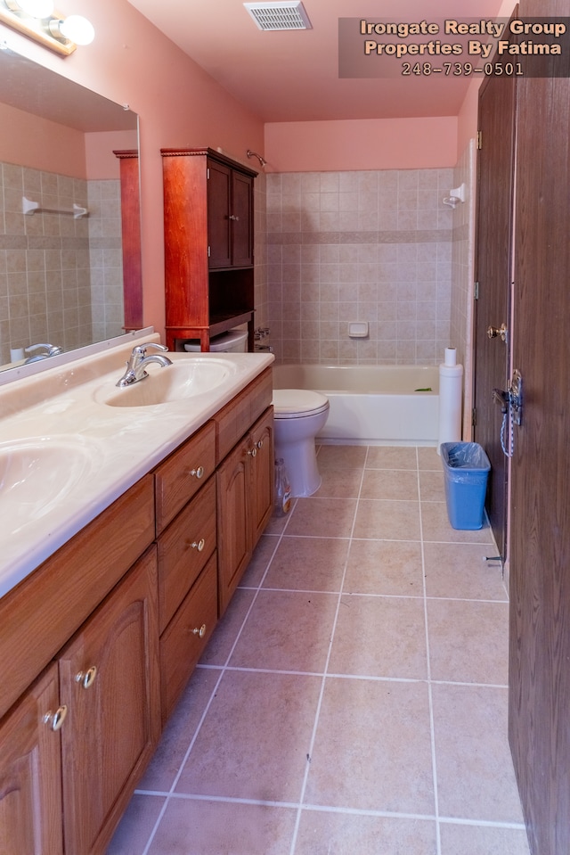 17906 Cider Mill St, Macomb, MI 48044 - bathroom featuring tile patterned flooring, double vanity, and toilet