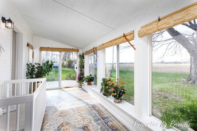 view of patio with a porch and a rural view