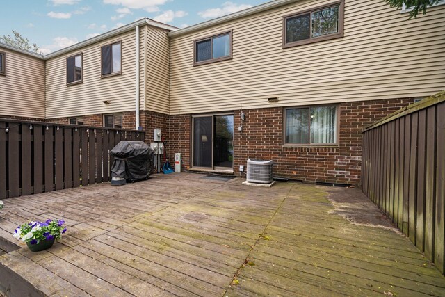 deck featuring area for grilling and central air condition unit