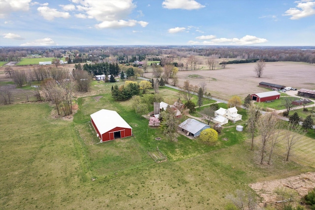 birds eye view of property featuring a rural view