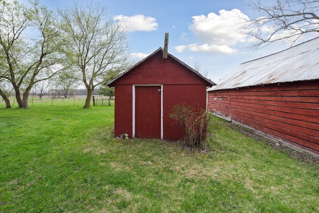 view of shed with fence