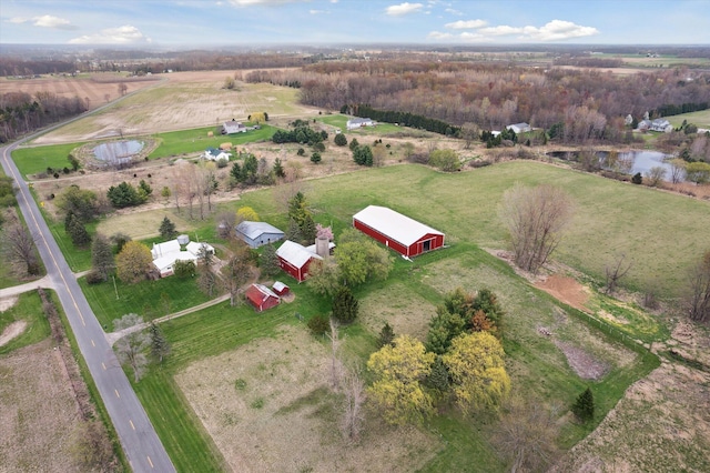 aerial view featuring a rural view and a water view