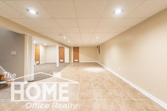 finished basement with recessed lighting and baseboards