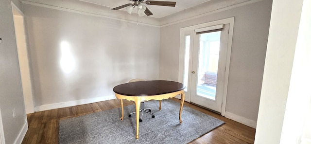 interior space with wood finished floors, ceiling fan, and plenty of natural light