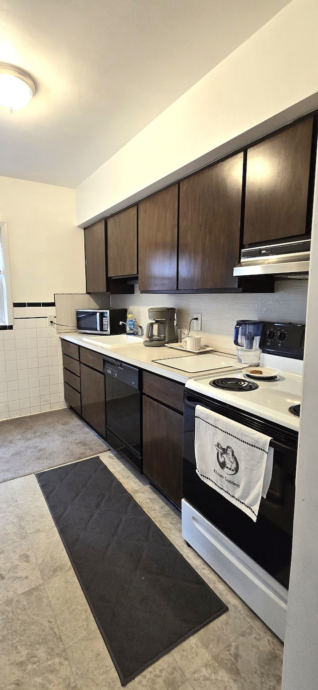kitchen featuring range with electric stovetop, dark brown cabinets, dishwasher, and light countertops