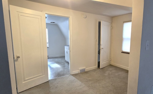 unfurnished bedroom with baseboards, visible vents, and carpet flooring