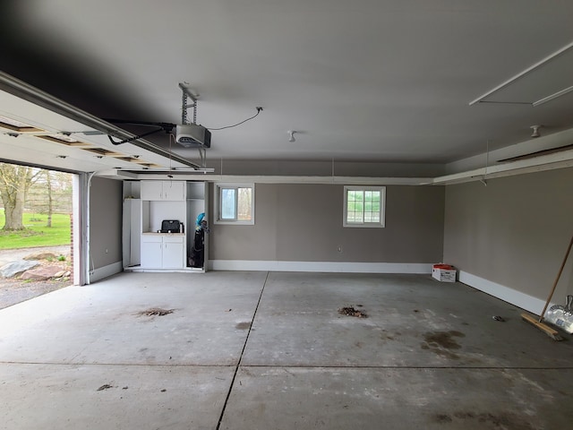 24800 Dayton Rd, Armada, MI 48005 - garage with baseboards and a garage door opener