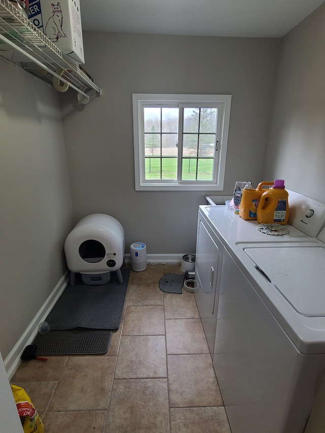 24800 Dayton Rd, Armada, MI 48005 - laundry area with baseboards, laundry area, and washer and clothes dryer