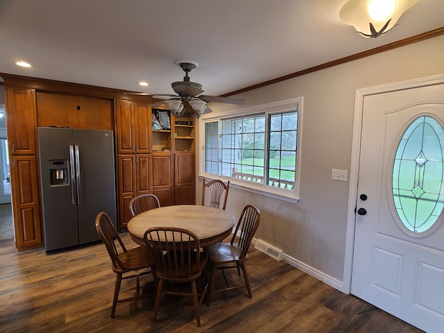 24800 Dayton Rd, Armada, MI 48005 - dining area with crown molding, a ceiling fan, visible vents, and dark wood-type flooring