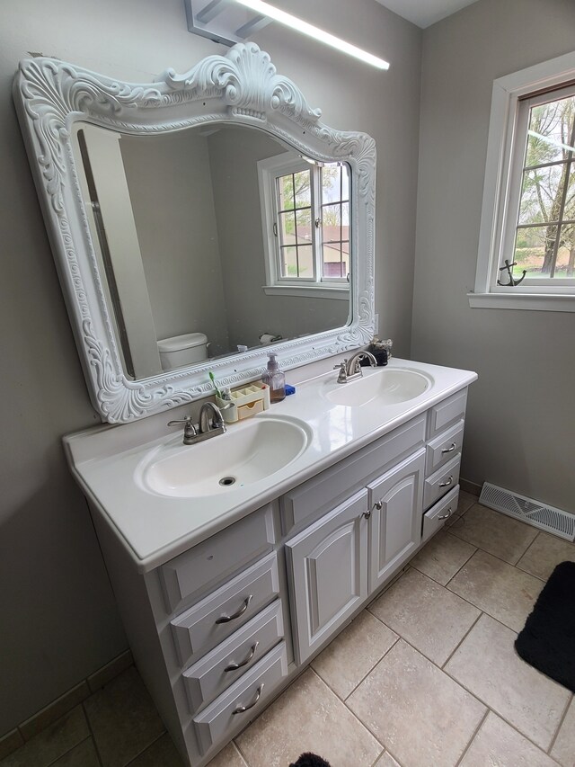 24800 Dayton Rd, Armada, MI 48005 - full bath featuring visible vents, plenty of natural light, and a sink