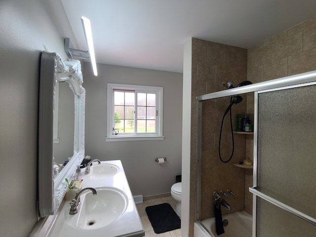 24800 Dayton Rd, Armada, MI 48005 - bathroom with toilet, double vanity, a sink, and enclosed tub / shower combo