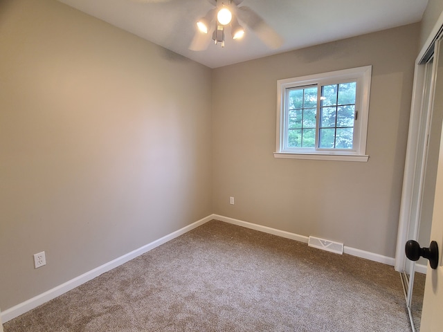 24800 Dayton Rd, Armada, MI 48005 - carpeted spare room with baseboards, visible vents, and ceiling fan