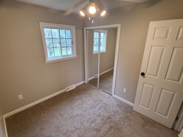 24800 Dayton Rd, Armada, MI 48005 - unfurnished bedroom featuring carpet floors, a closet, ceiling fan, baseboards, and visible vents