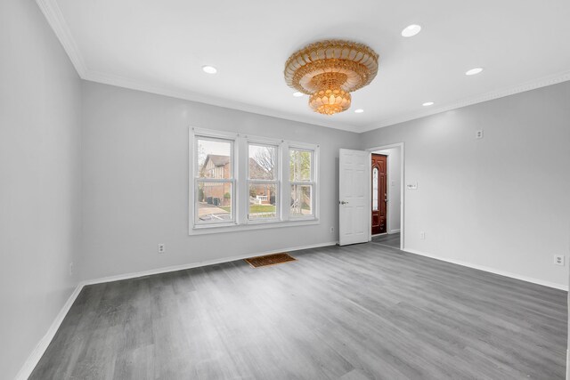 5281 Middlesex St, Dearborn, MI 48126 - unfurnished room featuring baseboards, recessed lighting, ornamental molding, and wood finished floors