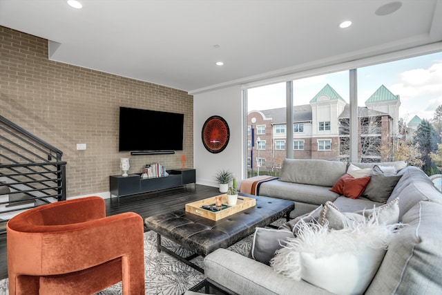 311 Alfred St, Detroit, MI 48201 - living area featuring recessed lighting, stairs, wood finished floors, and brick wall