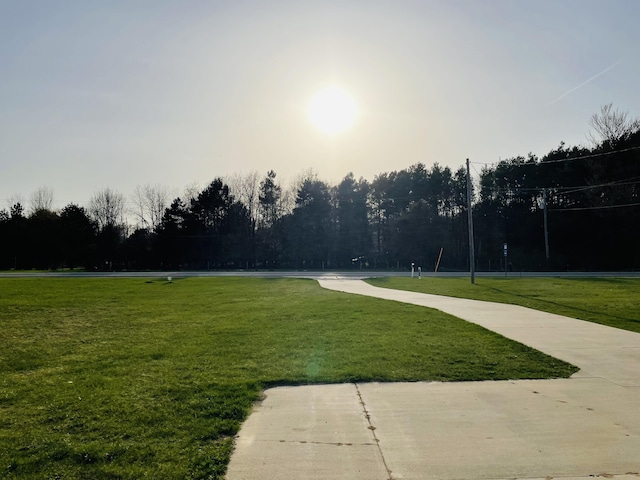surrounding community with a lawn