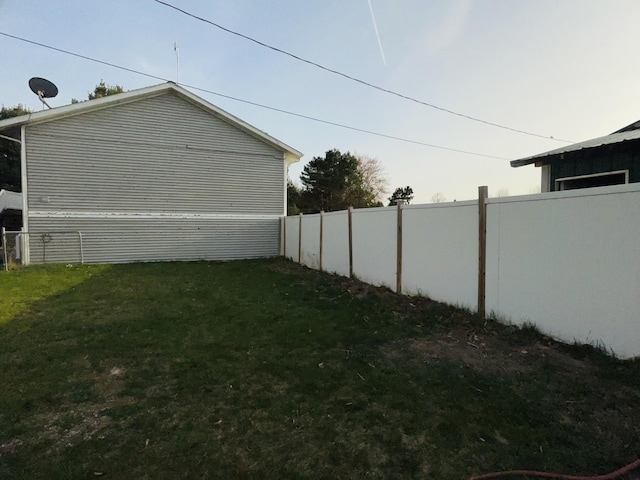 view of yard featuring fence