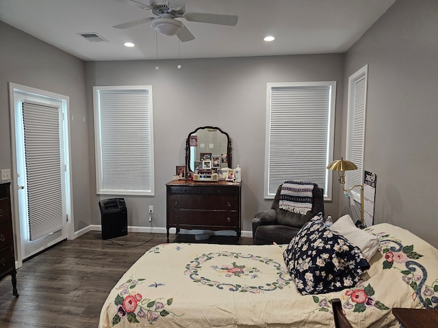 bedroom featuring visible vents, recessed lighting, dark wood finished floors, and baseboards