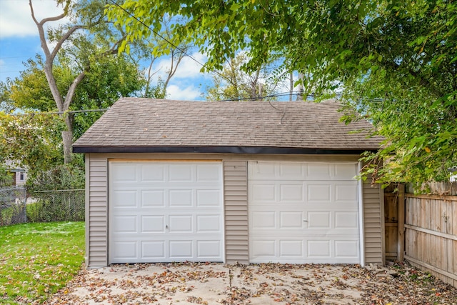 detached garage with fence