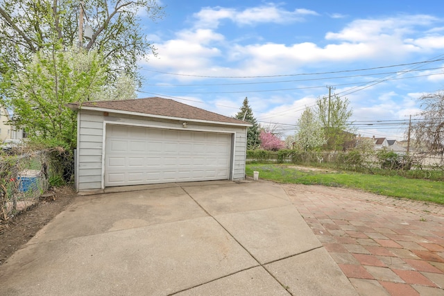 detached garage with fence