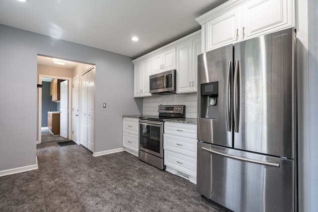 29742 Old Bedford St, Farmington Hills, MI 48331 - kitchen featuring stainless steel appliances, dark carpet, white cabinetry, baseboards, and decorative backsplash