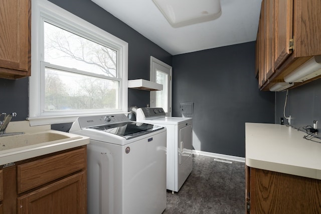 29742 Old Bedford St, Farmington Hills, MI 48331 - laundry area featuring cabinet space, washing machine and clothes dryer, and baseboards