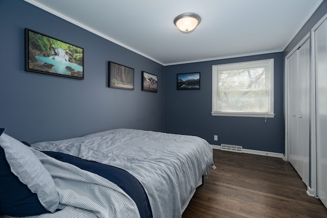 29742 Old Bedford St, Farmington Hills, MI 48331 - bedroom with wood finished floors, baseboards, a closet, and ornamental molding