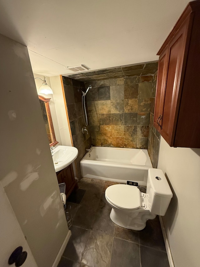 2976 Giddings Blvd, Highland, MI 48356 - bathroom featuring vanity, visible vents, toilet, and bathtub / shower combination