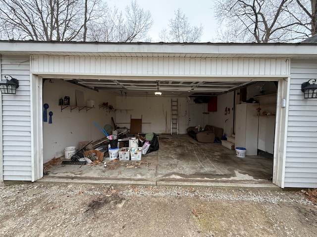 2976 Giddings Blvd, Highland, MI 48356 - garage with dirt driveway