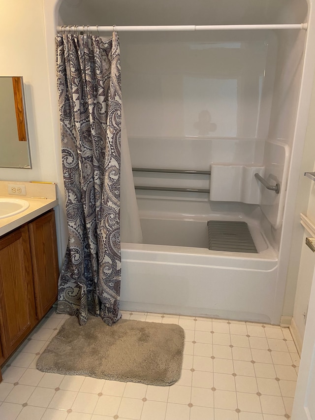 full bathroom featuring shower / bath combination with curtain and vanity