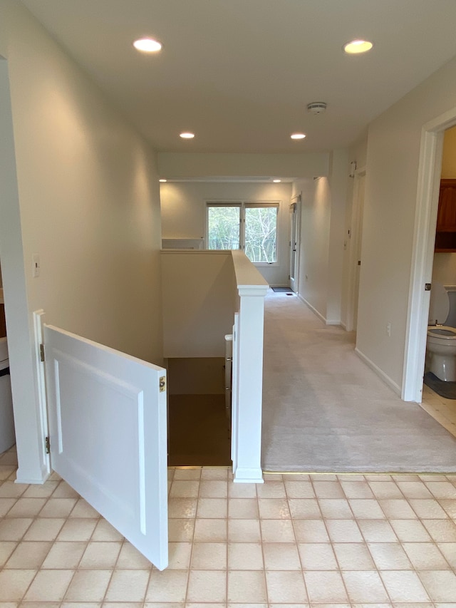 stairway featuring recessed lighting and carpet floors