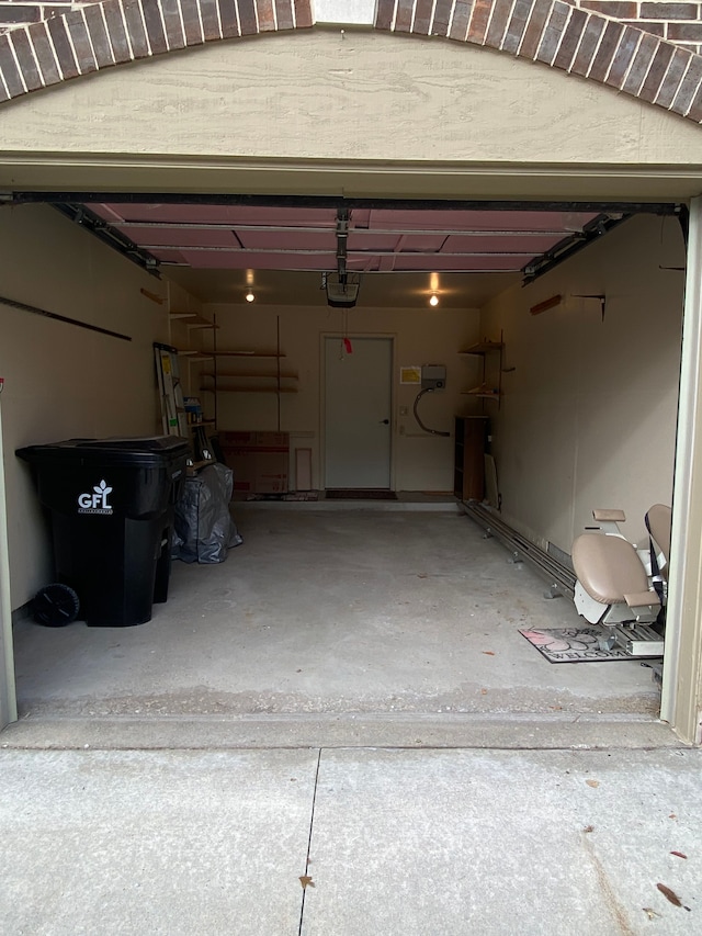garage featuring a garage door opener