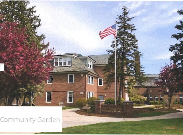 view of home's exterior with brick siding