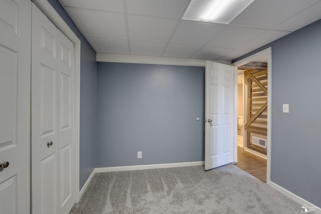interior space featuring carpet, visible vents, a closet, and baseboards