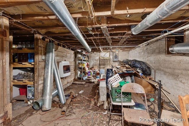unfinished basement with heating unit
