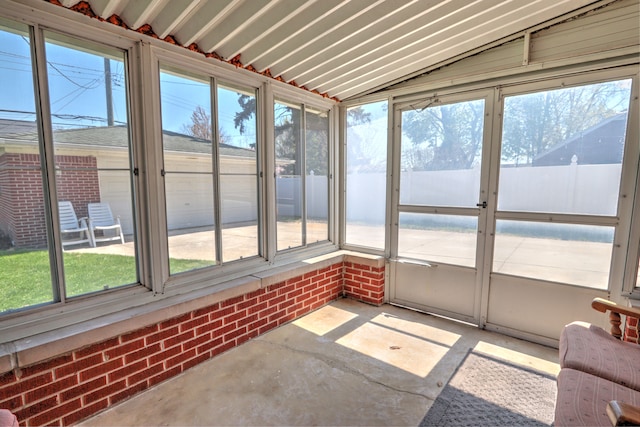 unfurnished sunroom featuring plenty of natural light