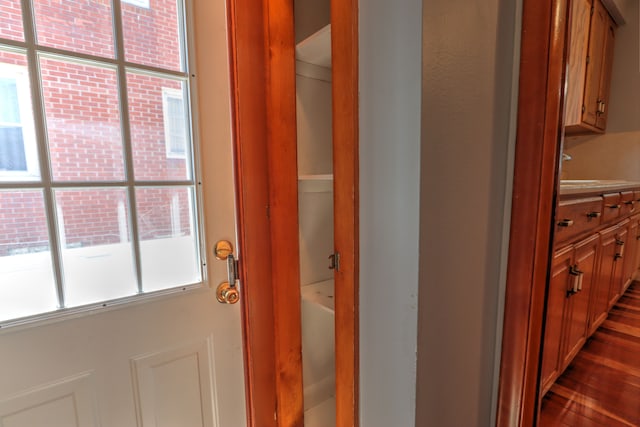 doorway to outside with dark wood finished floors