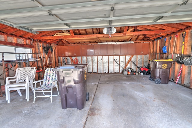 garage featuring a garage door opener