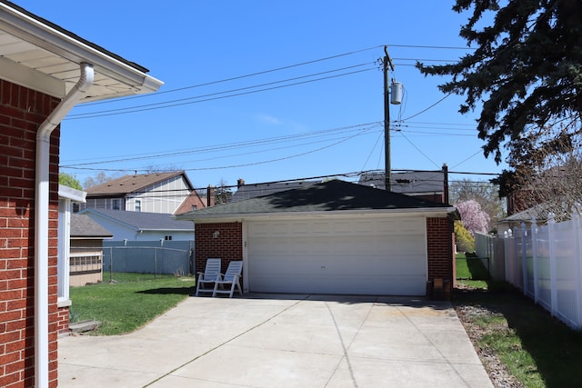 detached garage with fence