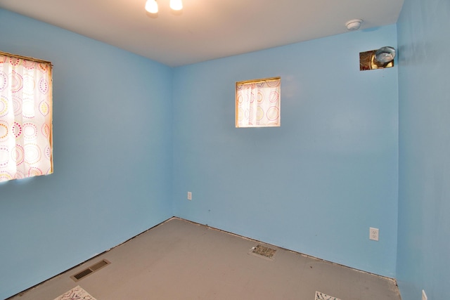 empty room featuring visible vents