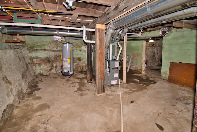 unfinished basement featuring heating unit and water heater