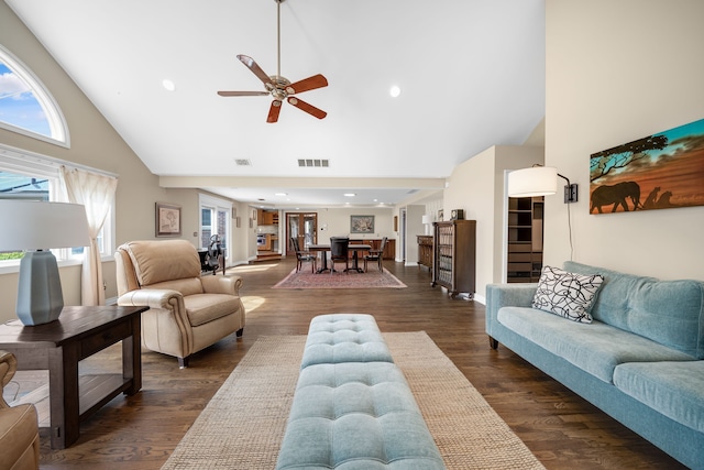 living room featuring high vaulted ceiling, plenty of natural light, a ceiling fan, and visible vents