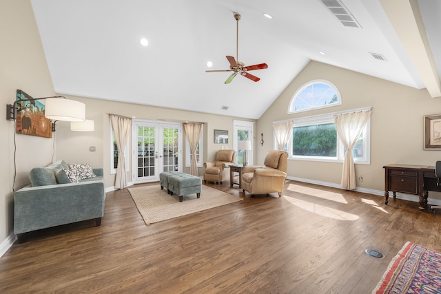 living room featuring visible vents, ceiling fan, a healthy amount of sunlight, and high vaulted ceiling