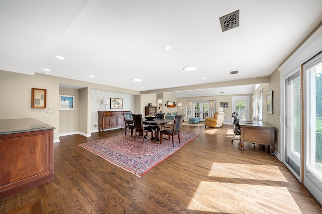 dining space with recessed lighting, dark wood-style floors, and a wealth of natural light