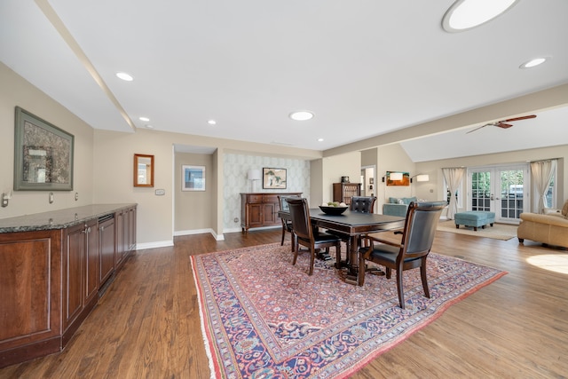 dining area featuring dark wood-type flooring, recessed lighting, and baseboards
