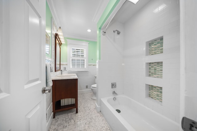 full bathroom featuring shower / bath combination, tile walls, tile patterned floors, vanity, and toilet