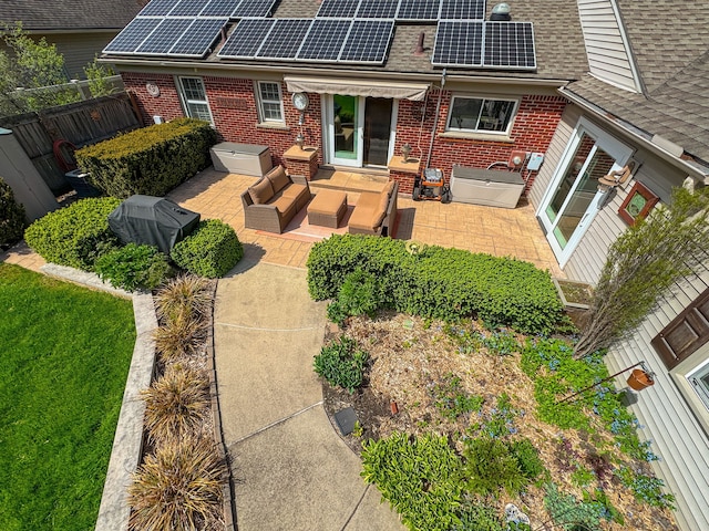 view of patio / terrace featuring fence and outdoor lounge area